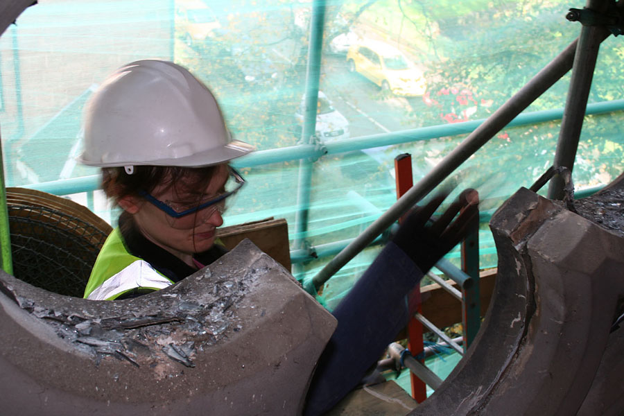 Joy removing Rose Window